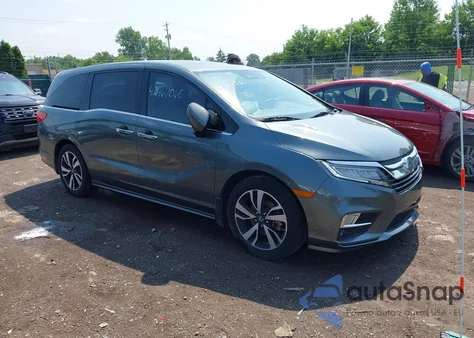 2019 Honda Odyssey Elite z USA, uszkodzony, nr VIN 5FNRL6H97KB094676
